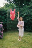 Alix in the garden in Brest and the worn bathing suit, view 1